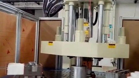 Macchina per lo stampaggio ad iniezione di plastica verticale ad alta velocità con tavola rotante